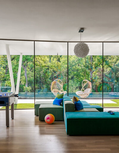 Artistic interior design with colorful art and furniture.